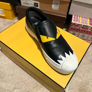 Fendi slip on sneakers black leather very softly worn.